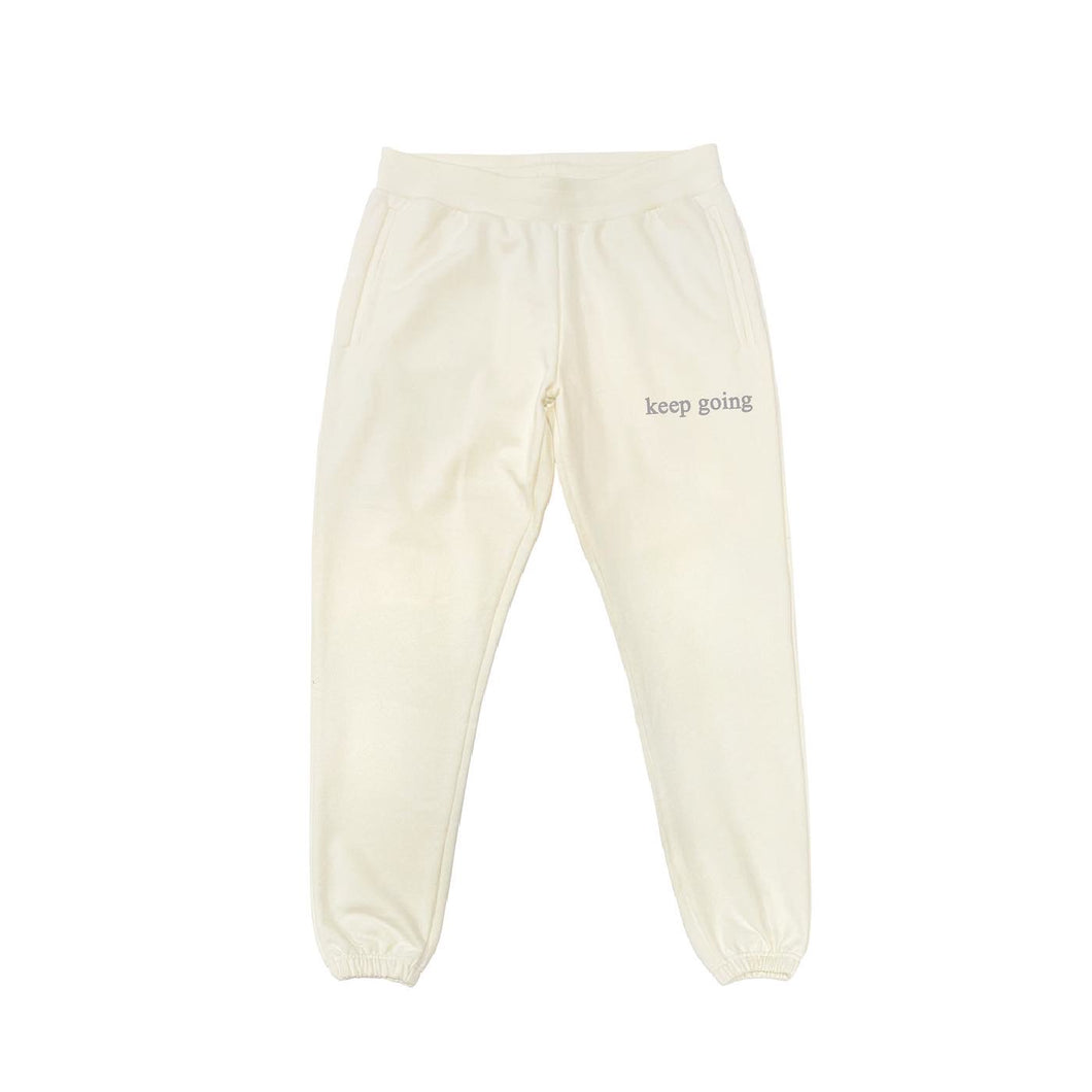 cream “keep going” sweat pants