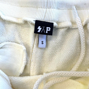 cream “keep going” sweat pants