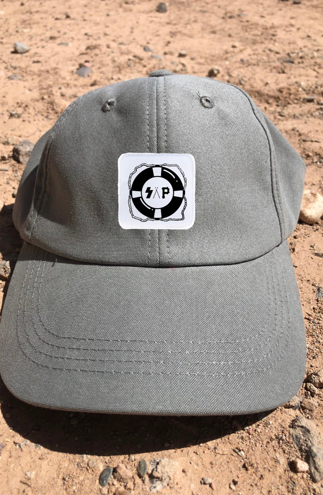 grey “lifesaver” sueded cap