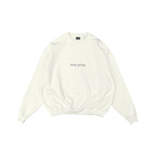 cream “keep going” crew neck sweatshirt