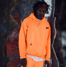 orange “Unite” Jump Suit